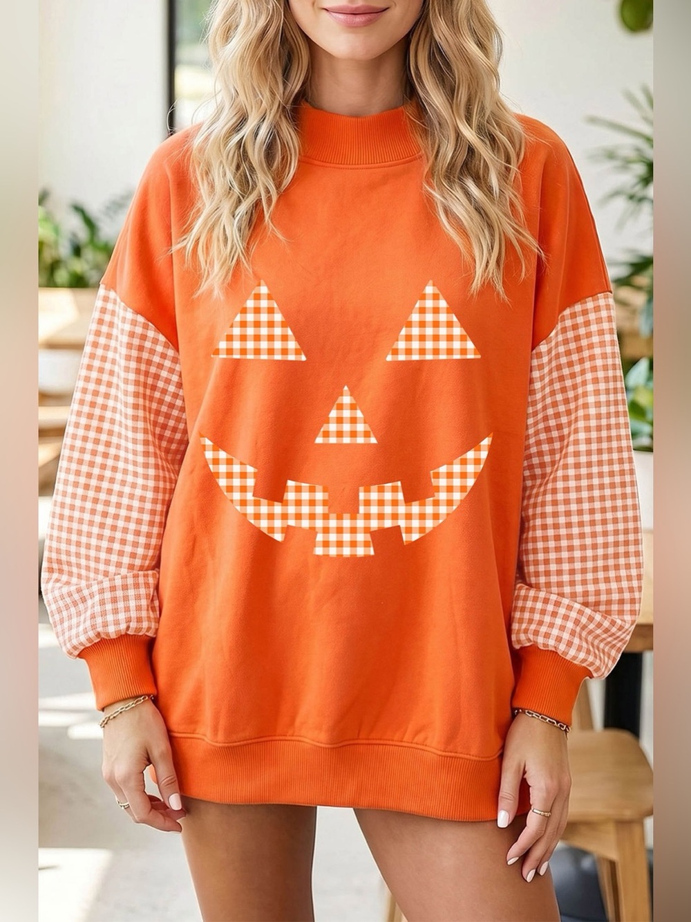 Plaid Sleeve Halloween Pumpkin Face Graphic Sweatshirt